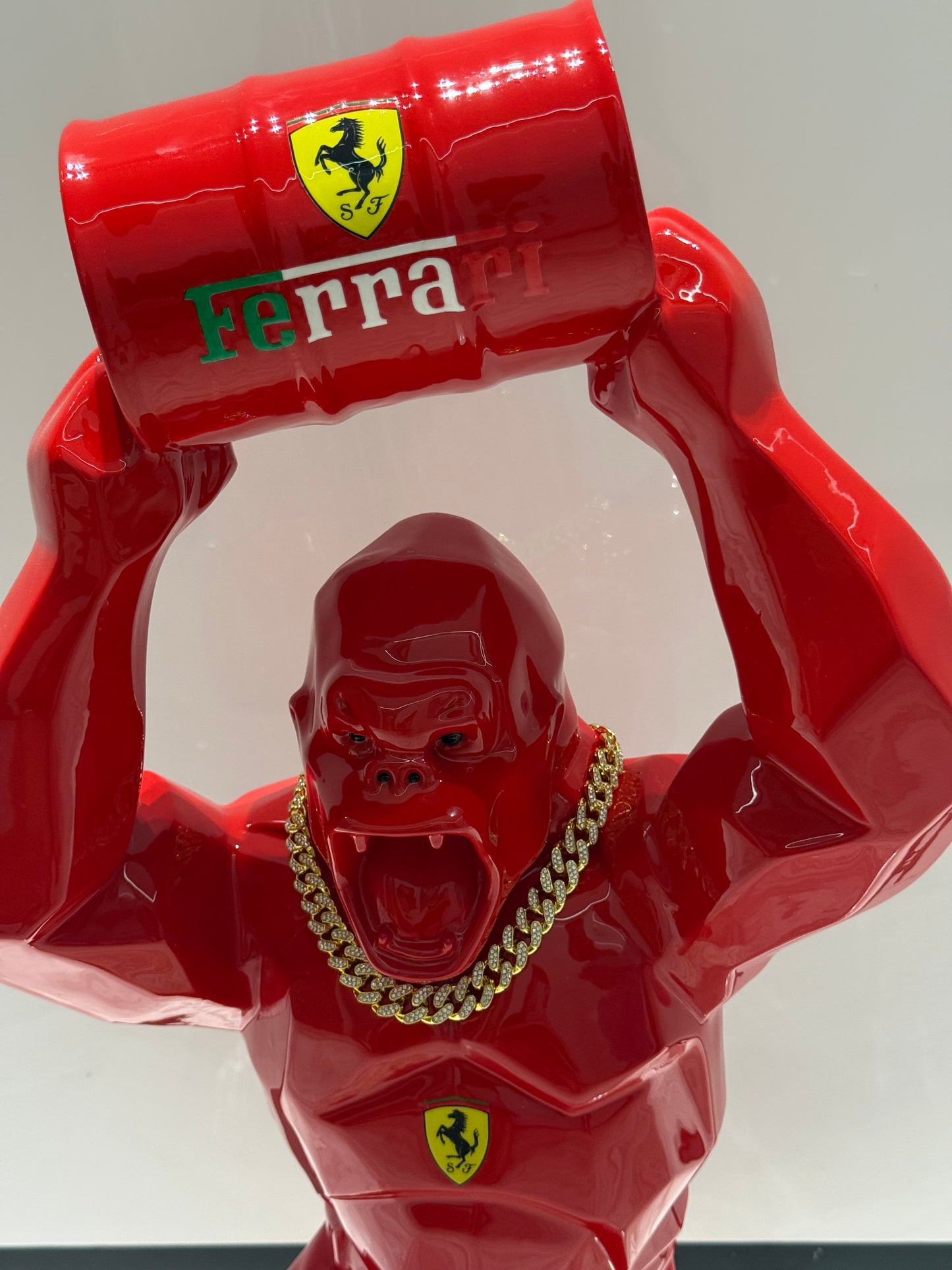 Red Ferrari Gorilla Sculpture with Barrel
