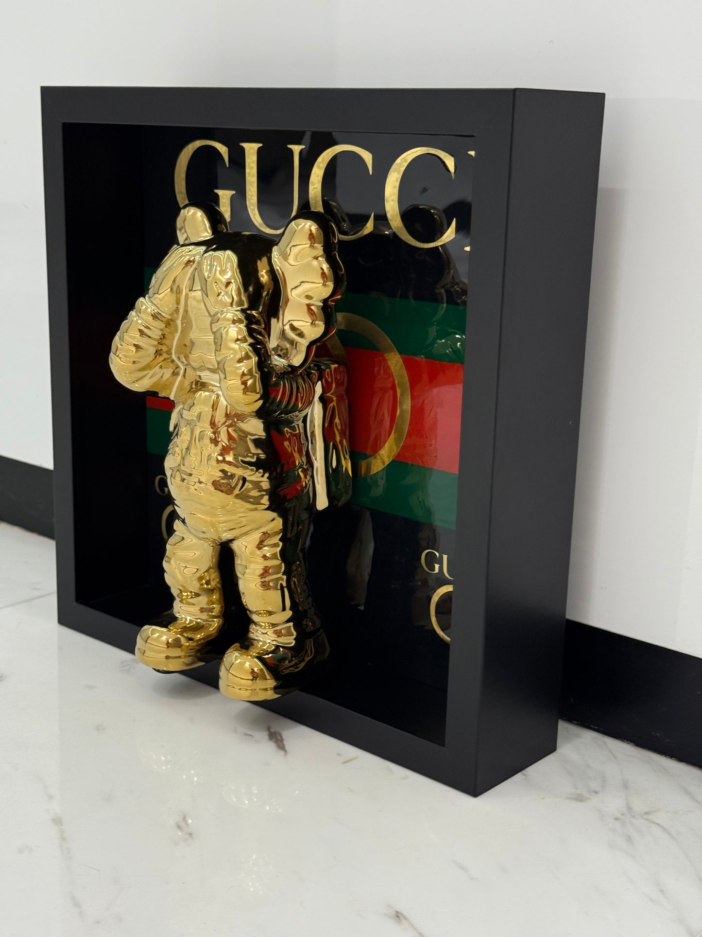 Gold Astronaut in Gucci Box Frame – Luxury Art Meets Iconic Fashion
