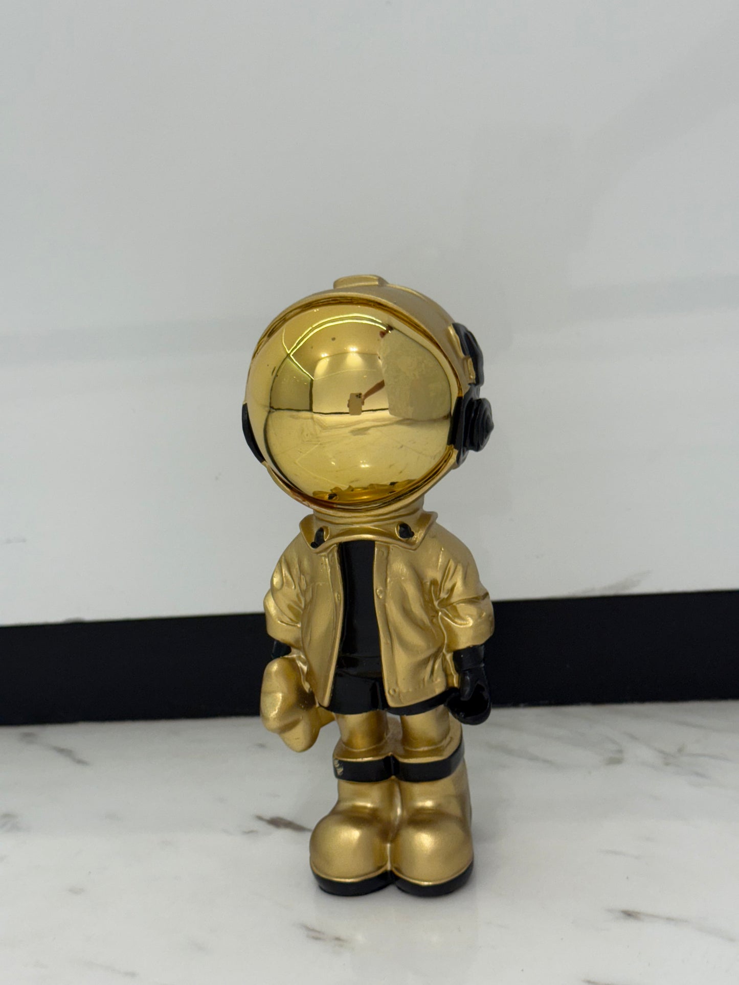 Golden Astronaut Figurine - A Stellar Collectible