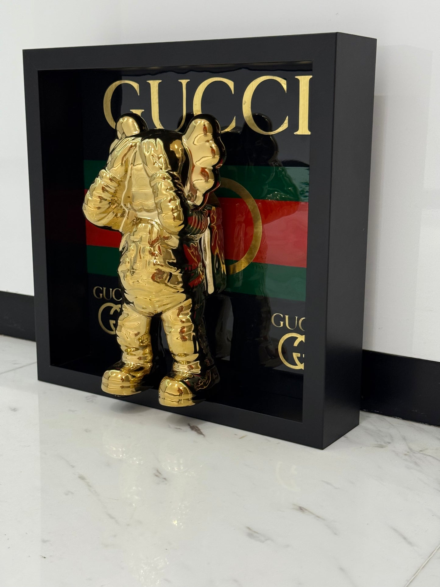 Gold Astronaut in Gucci Box Frame – Luxury Art Meets Iconic Fashion