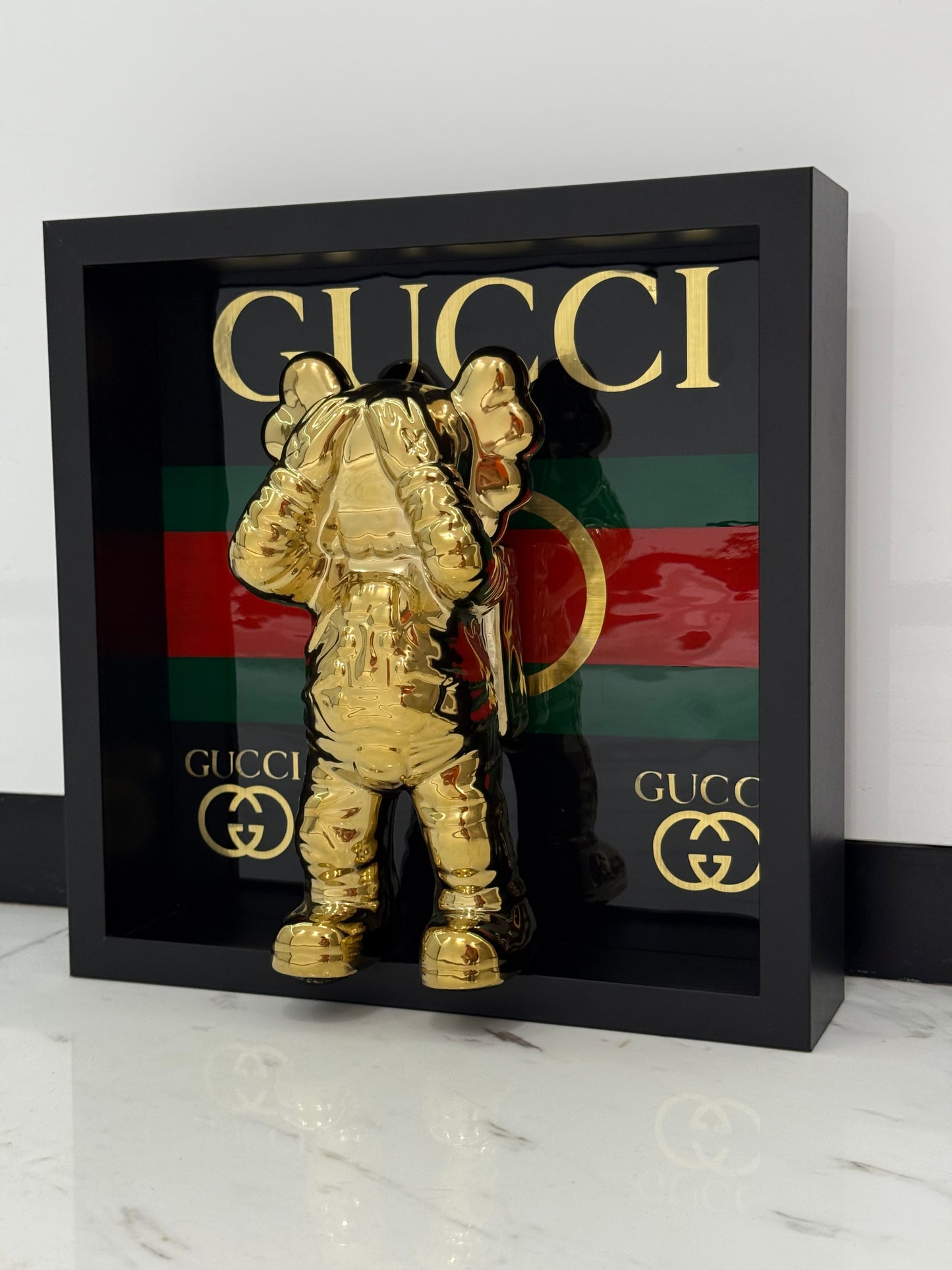 Gold Astronaut in Gucci Box Frame – Luxury Art Meets Iconic Fashion