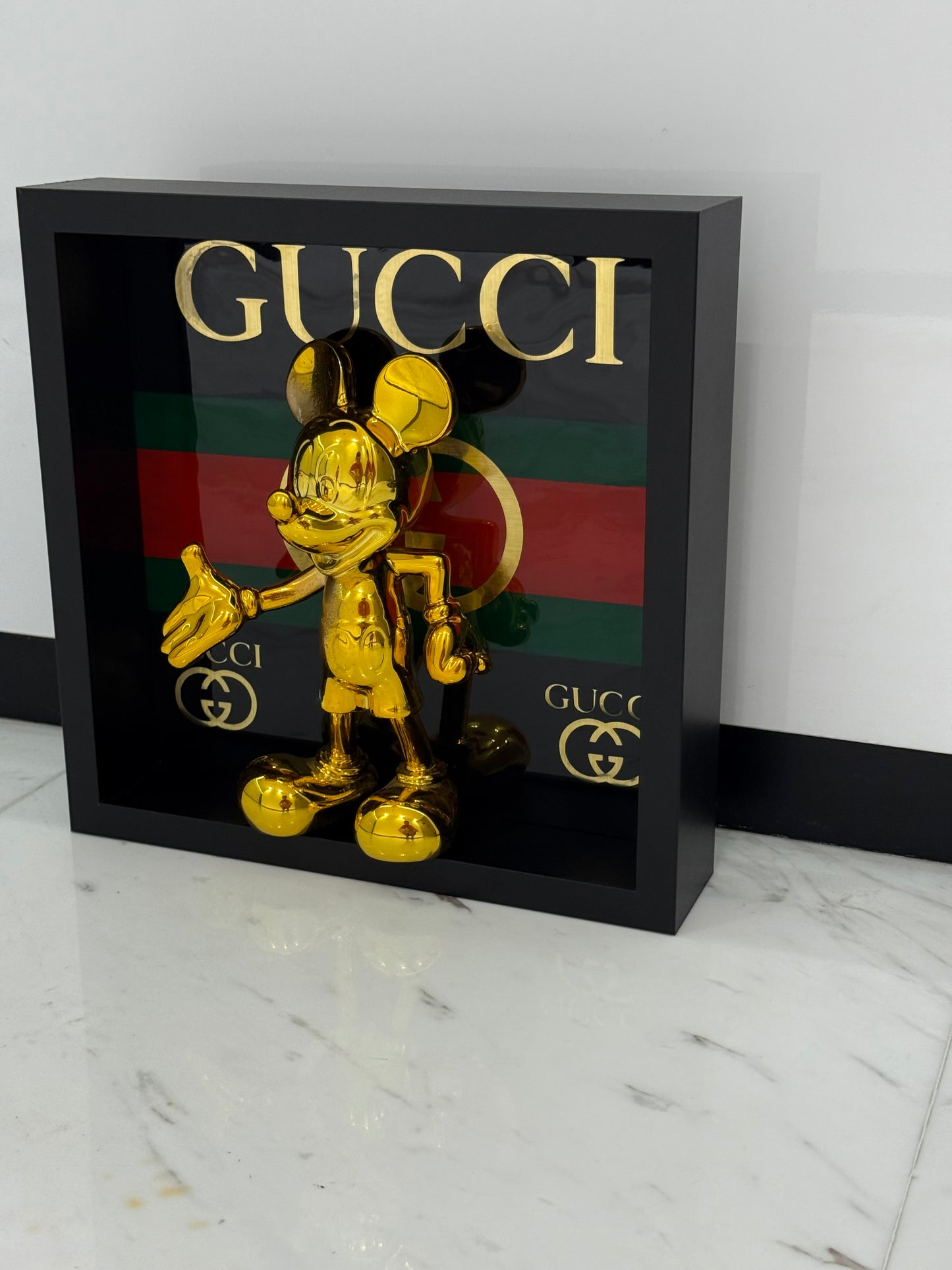 Golden Mickey in Gucci Box Frame – A Fusion of Playful Icon & Luxury Design