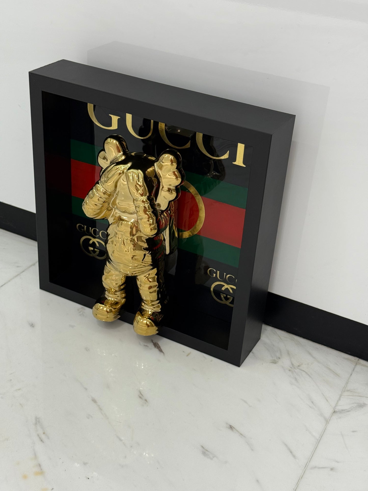Gold Astronaut in Gucci Box Frame – Luxury Art Meets Iconic Fashion