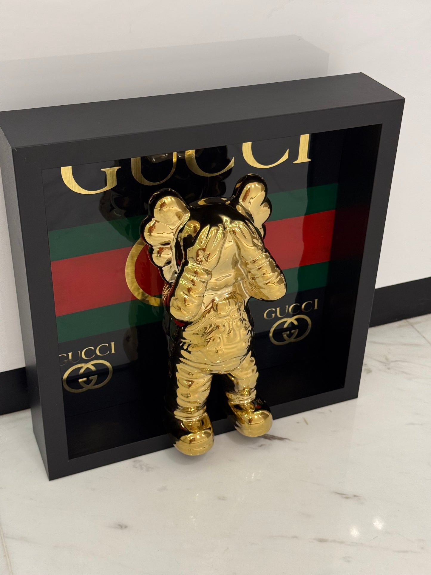 Gold Astronaut in Gucci Box Frame – Luxury Art Meets Iconic Fashion