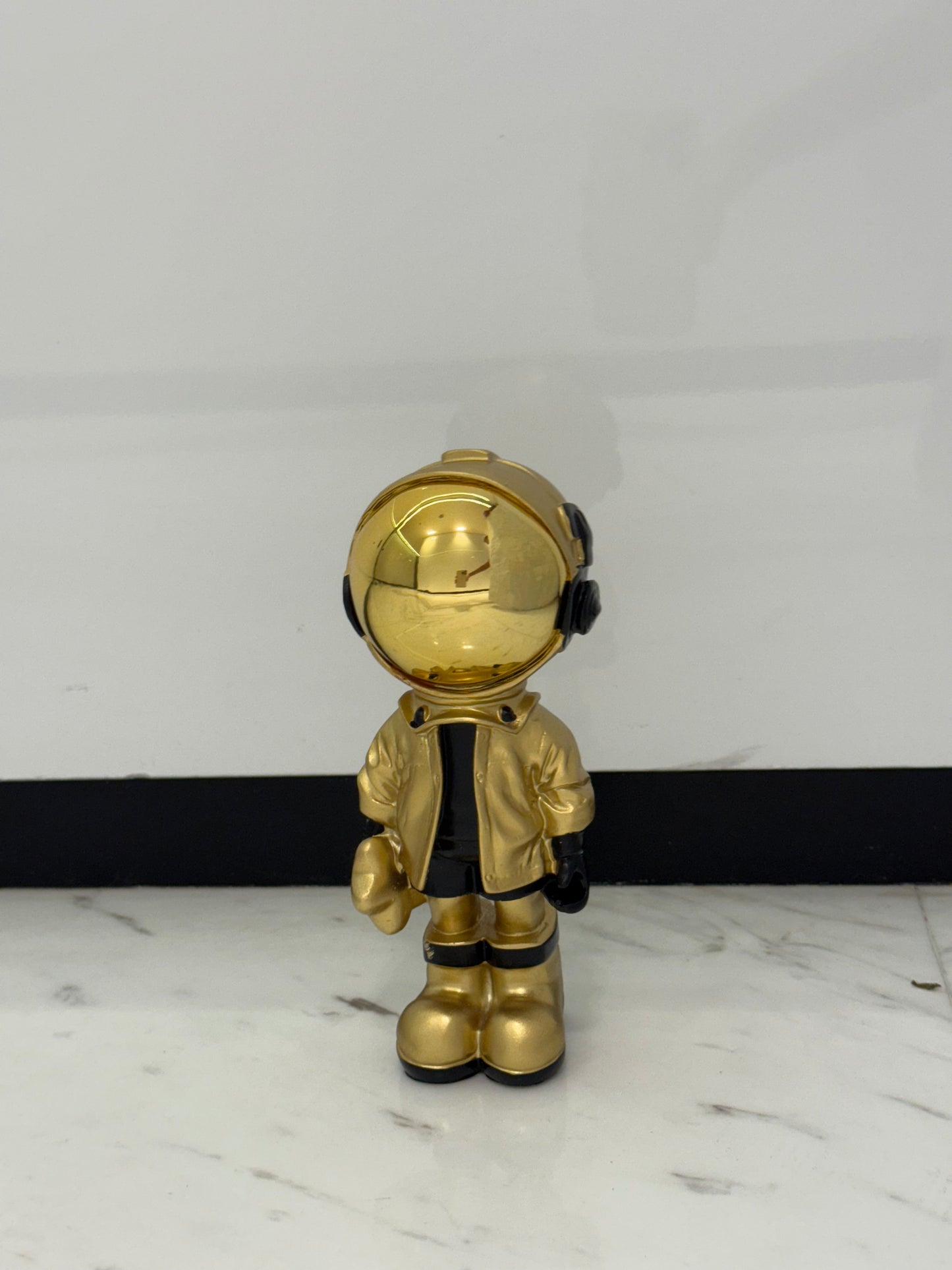 Golden Astronaut Figurine - A Stellar Collectible