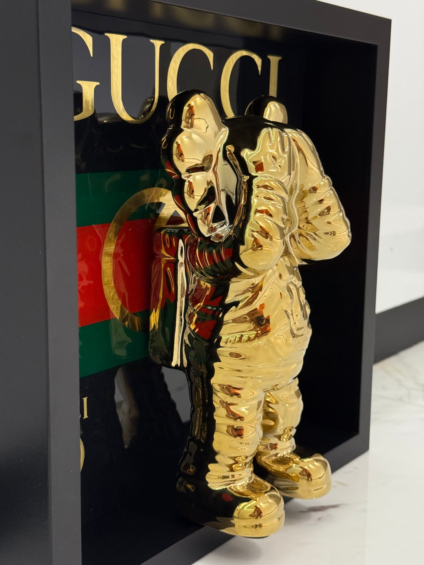 Gold Astronaut in Gucci Box Frame – Luxury Art Meets Iconic Fashion