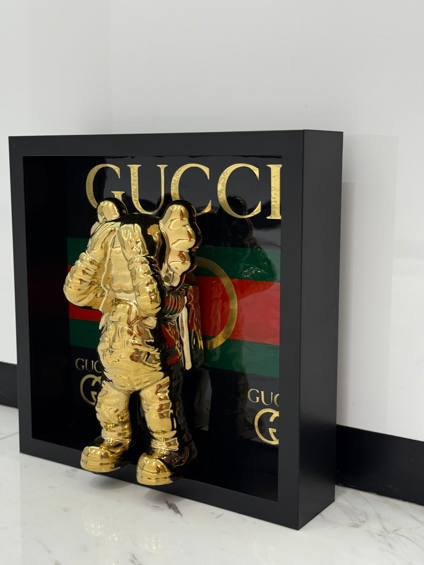 Gold Astronaut in Gucci Box Frame – Luxury Art Meets Iconic Fashion