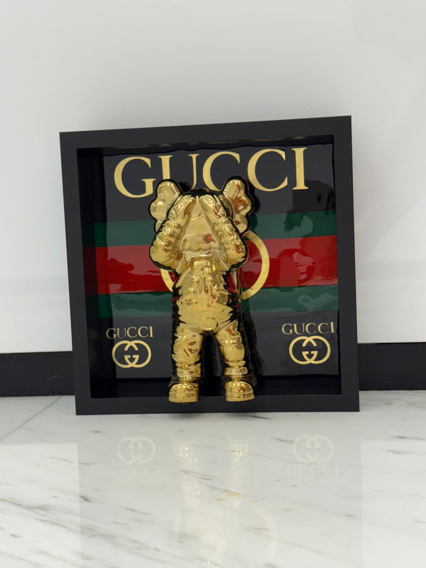 Gold Astronaut in Gucci Box Frame – Luxury Art Meets Iconic Fashion