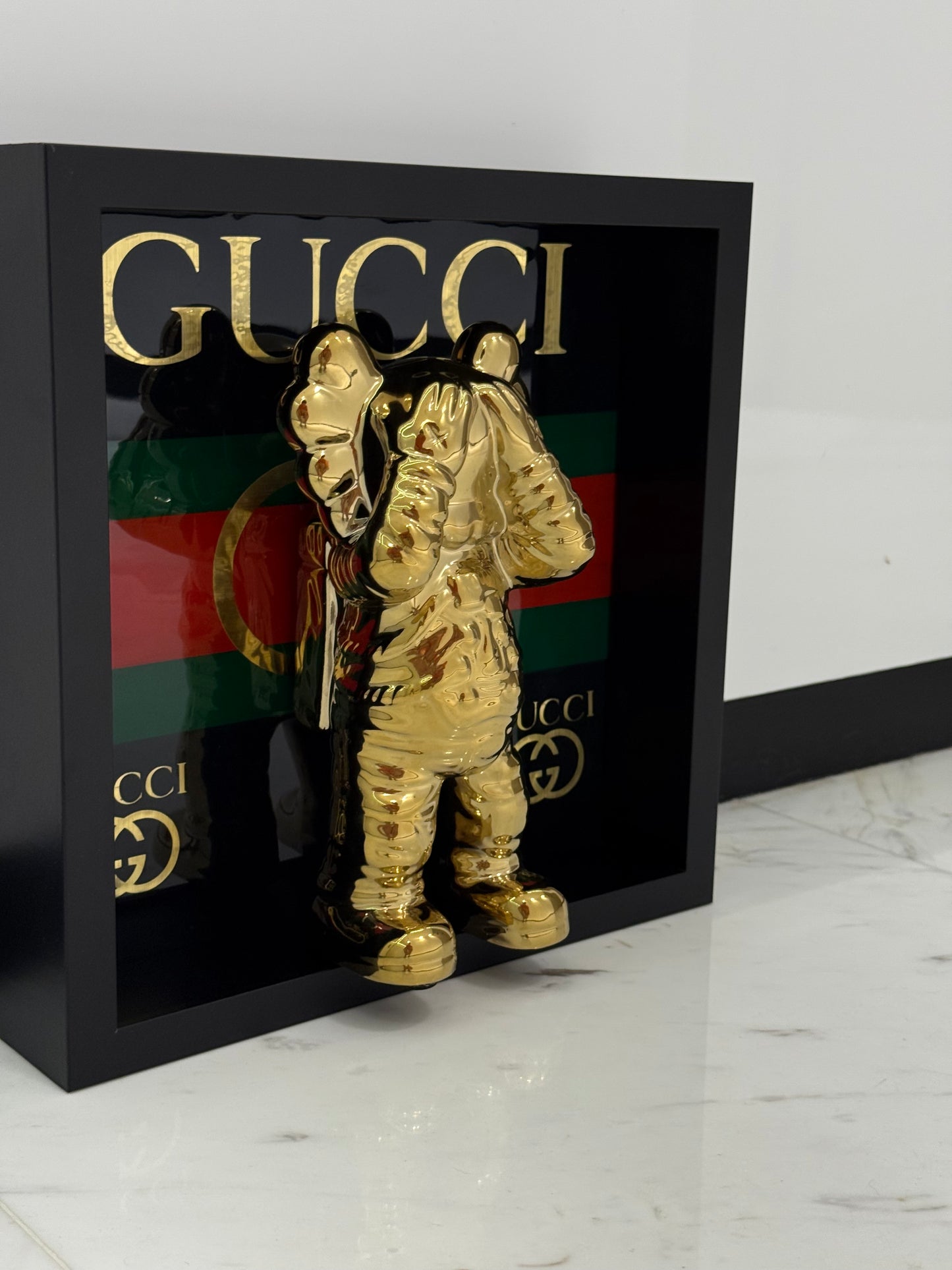 Gold Astronaut in Gucci Box Frame – Luxury Art Meets Iconic Fashion