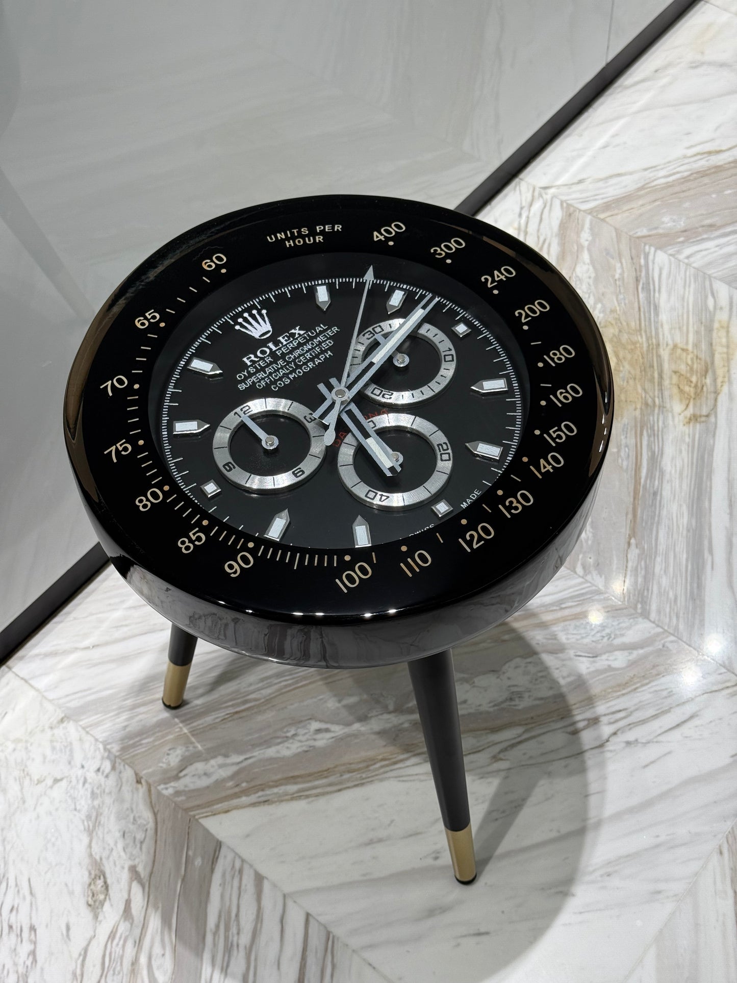 Black Rolex watch round side table