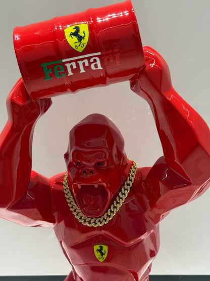 Red Ferrari Gorilla Sculpture with Barrel