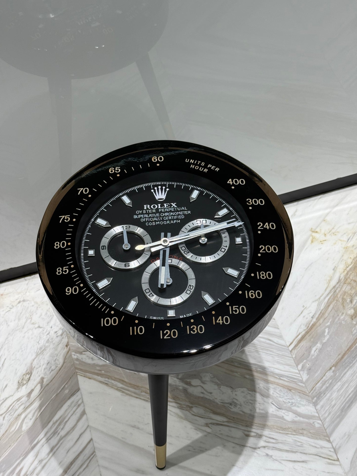 Black Rolex watch round side table