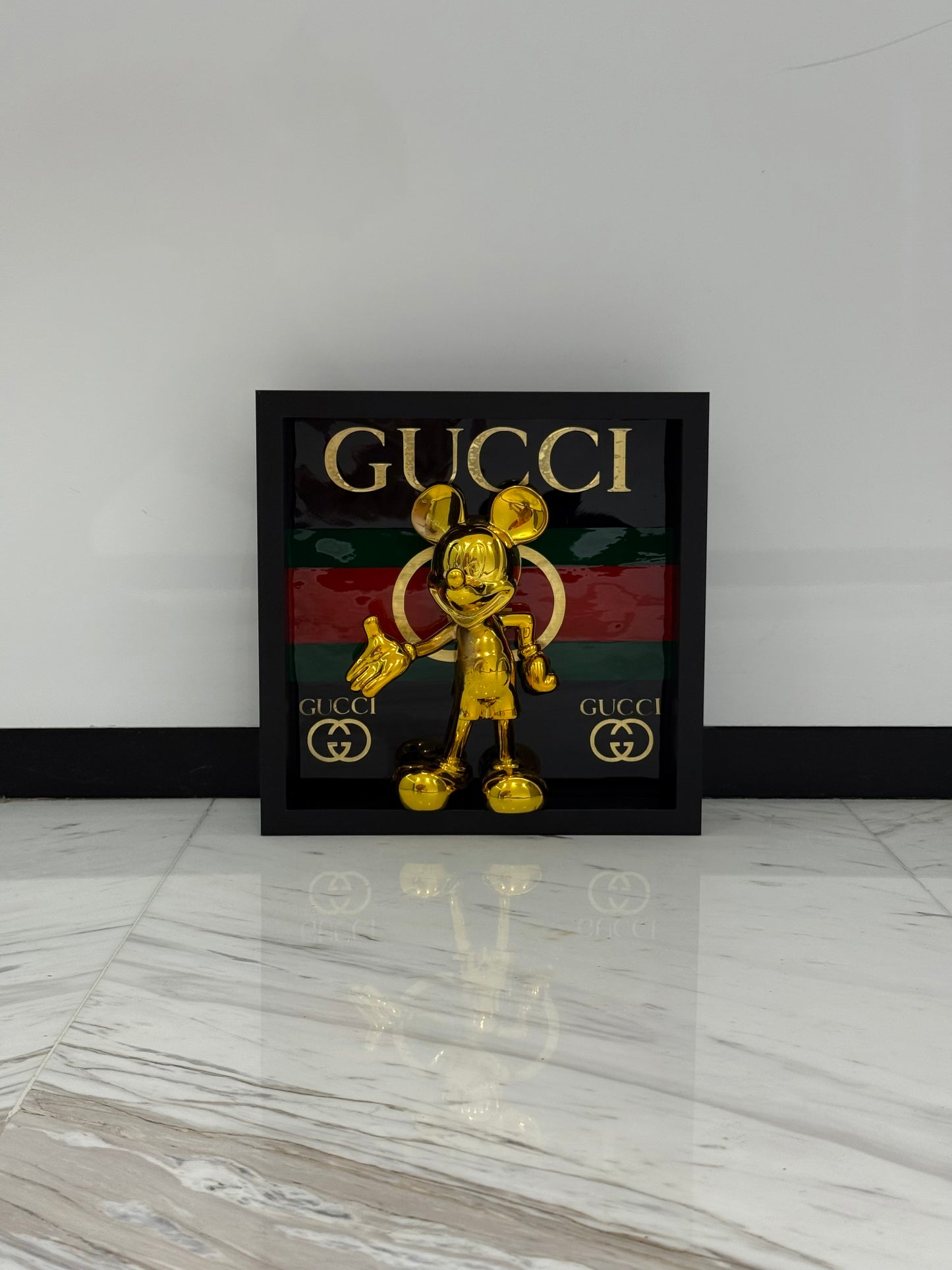 Golden Mickey in Gucci Box Frame – A Fusion of Playful Icon & Luxury Design