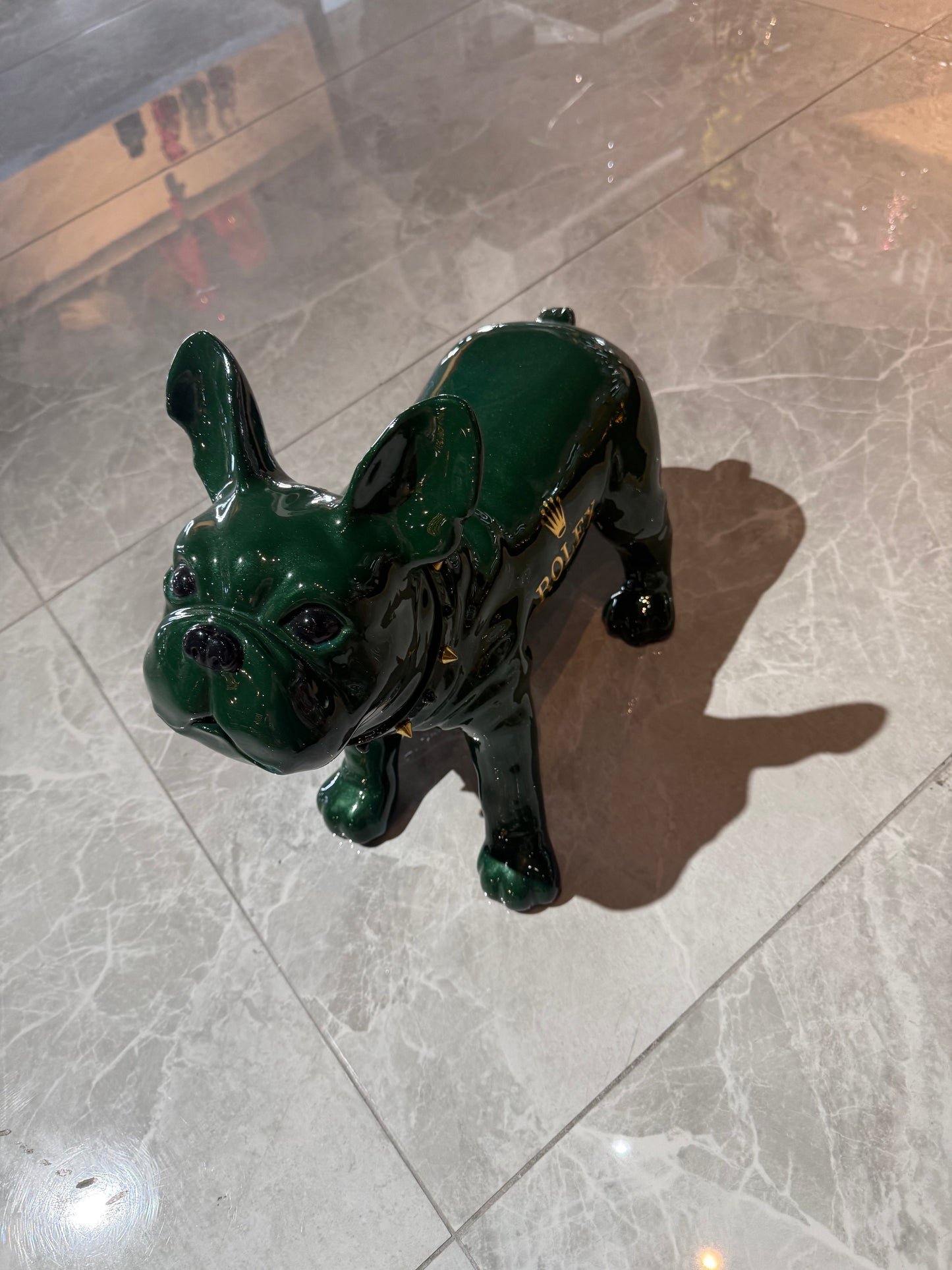 Green Rolex Dog Sculpture – Luxury Loyalty in Art Form