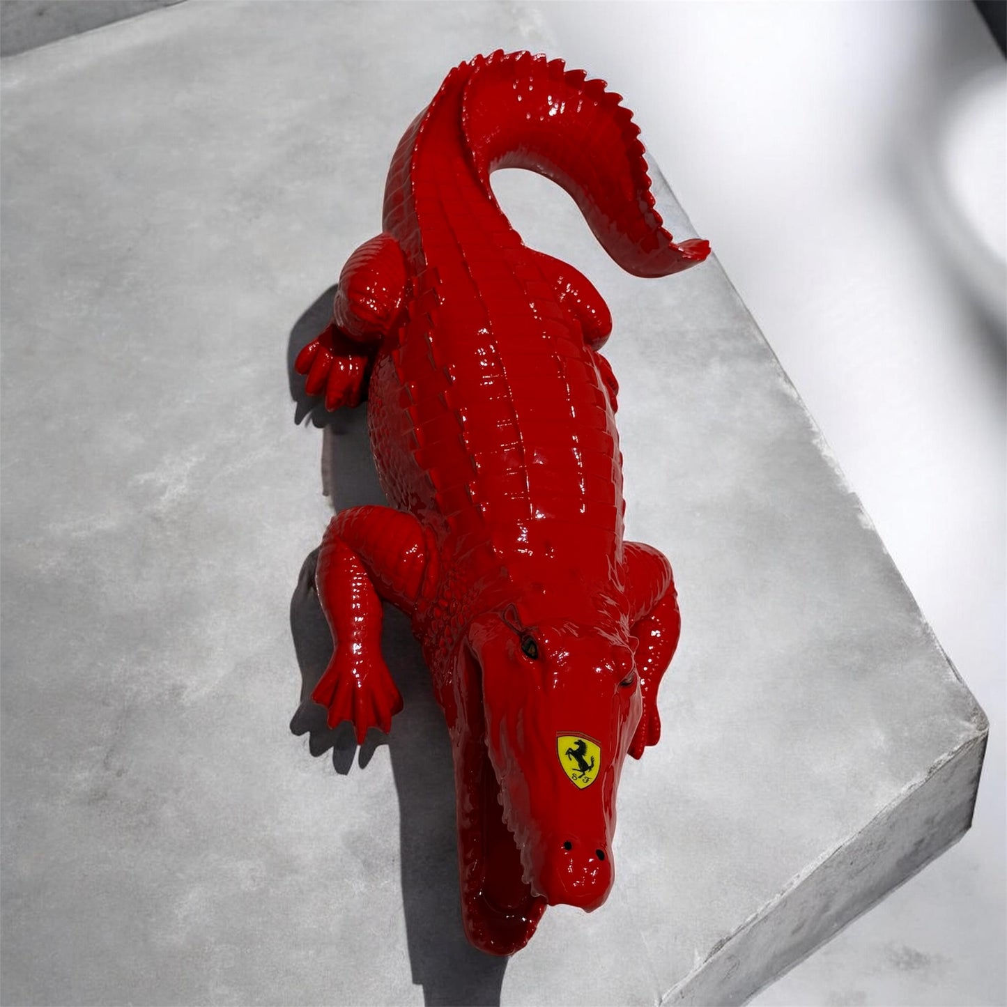 Rosso Predator – Automotive inspired Red Crocodile Sculpture
