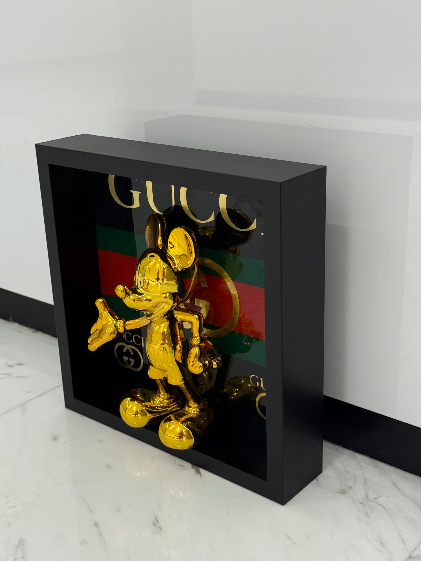 Golden Mickey in Gucci Box Frame – A Fusion of Playful Icon & Luxury Design