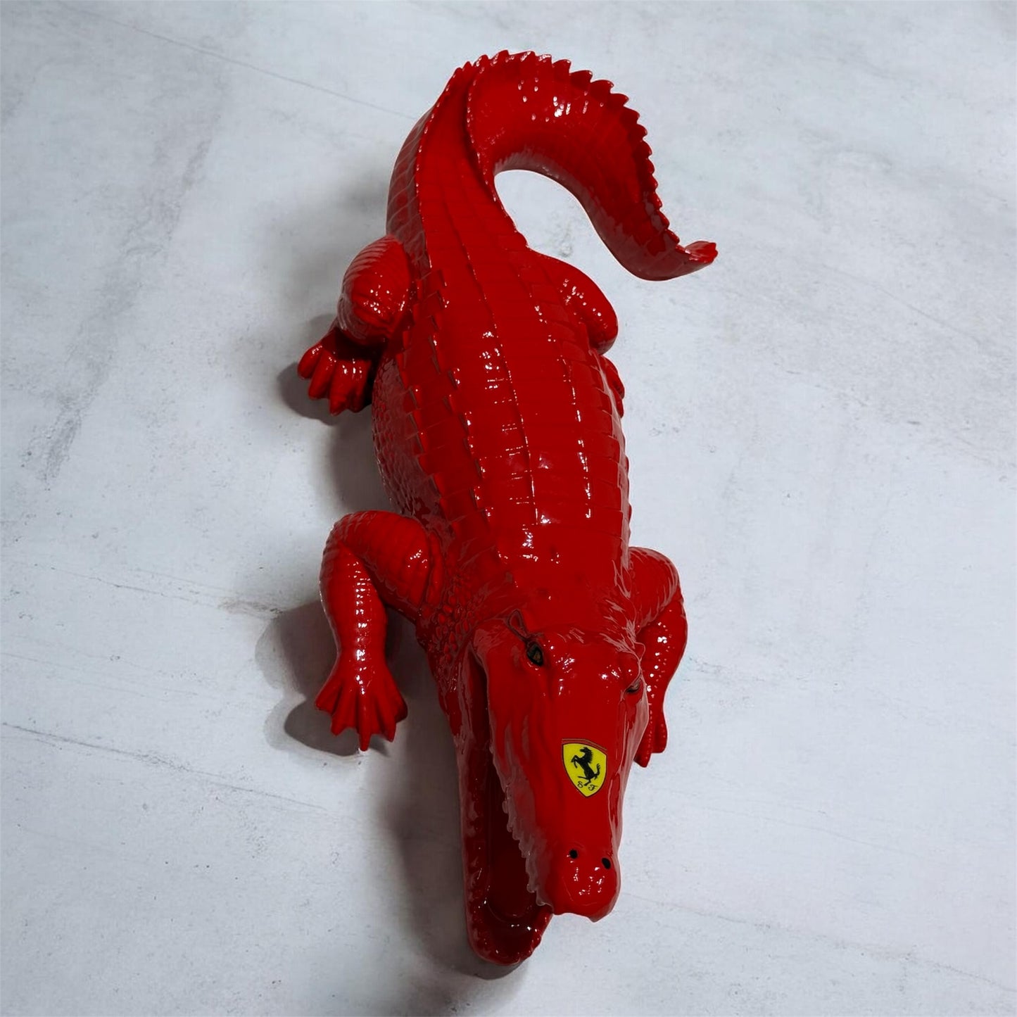 Rosso Predator – Automotive inspired Red Crocodile Sculpture