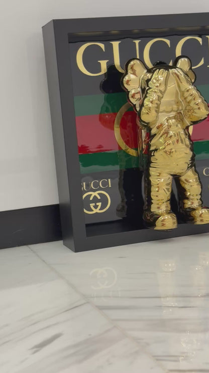Gold Astronaut in Gucci Box Frame – Luxury Art Meets Iconic Fashion